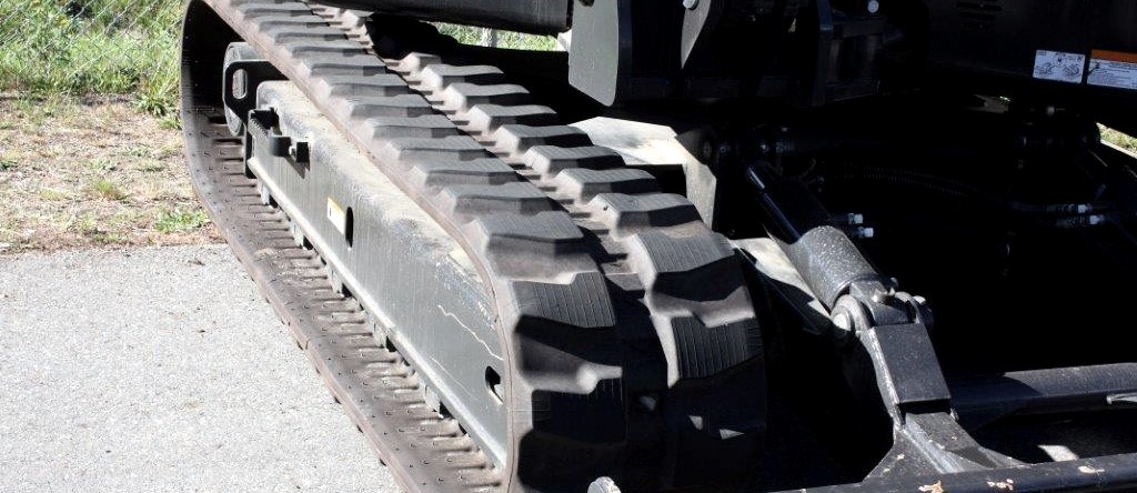 X-TRAC rubber track in service on a compact track loader
